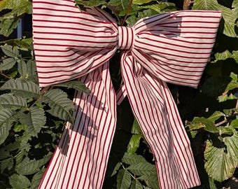 The most beautiful extra Large handmade bow in Belgian Red and White stripe cotton wadding added to the bow and ties seasonal perfection