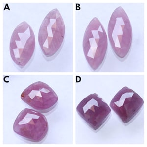 May include: Four pairs of faceted, pink gemstones. The gemstones are in different shapes: oval, marquise, and square. The stones have a polished, reflective surface, and are arranged against a white background. The gemstones are likely for jewelry making.