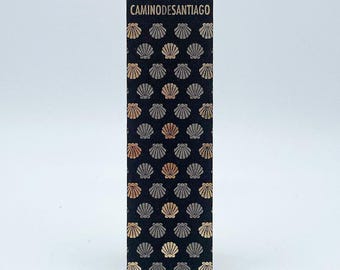 Bookmark - Screen printed on semi-rigid textile panel. Camino de Santiago Collection ref.: Golden Shell Bookmarks