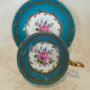 AYNSLEY Turquoise Teacup and Saucer with Open Rose in Centre