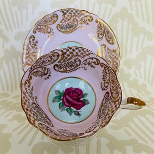 PARAGON Double Warrant RARE PINK Teacup and Saucer -  Gold Embellishments and Open Floating Cabbage Rose on Turquoise