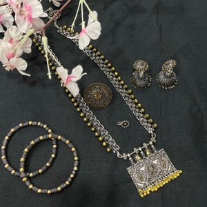 Vintage style oxidized silver bohemian jewelry flat lay