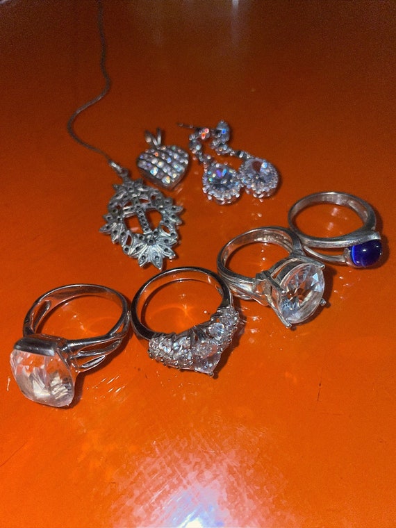 LotOf silver 4 rings 2 pendants 1 earring set