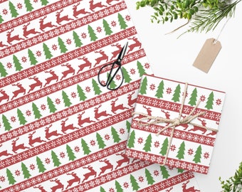 May include: Red and green Christmas wrapping paper with a repeating pattern of reindeer, snowflakes, and Christmas trees.