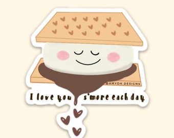 May include: A sticker with a cartoon s'more with the text "I love you s'more each day" and three brown hearts dripping from the chocolate.