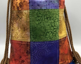 Patchwork Drawstring Backpack: Multi-colored Cotton Cinch Bag with Pocket