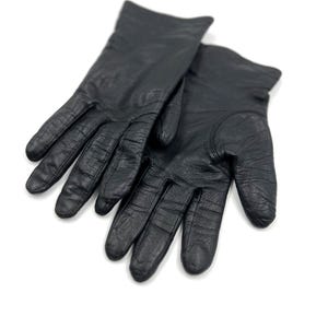 Vintage black leather gloves for women, lined, size 7, small