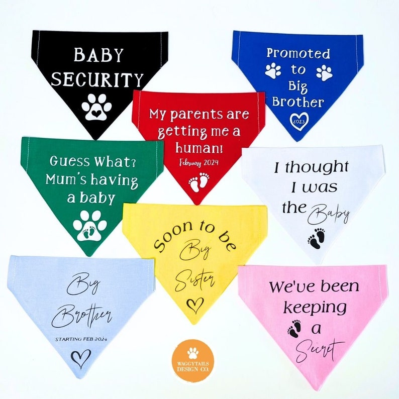 May include: Ten different dog bandanas with various colors and messages. The bandanas are made of fabric and have paw prints and hearts printed on them. The messages on the bandanas include "Baby Security", "Guess What? Mum's having a baby", "My parents are getting me a human! February 2024", "Promoted to Big Brother 2023", "I thought I was the Baby", "Big Brother Starting Feb 2024", "Soon to be Big Sister", "We've been keeping a Secret".