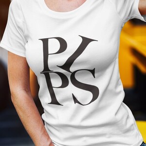 May include: A white t-shirt with a black graphic design that reads "RPS" in a stylized font.