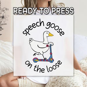 May include: White square with the text "READY TO PRESS" at the top. The image features a cartoon goose riding a scooter, with the words "speech goose on the loose" in a playful font. The goose is white with a yellow beak and is riding a blue and red scooter.