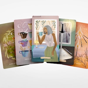 May include: Five tarot cards are fanned out, each with unique illustrations. One card depicts a woman holding a teacup, another shows teacups with plants, and others feature a sword, candles, and floral designs. The cards have a soft, watercolor style.