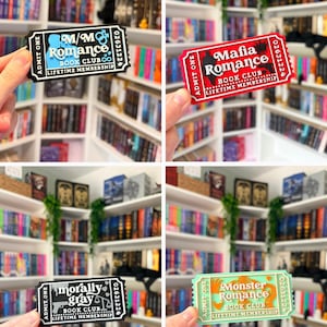May include: A collection of four rectangular admission tickets for book clubs. The tickets feature distinct designs: M/M Romance in blue and black, Mafia Romance in red and white, Morally Gray in black and white, and Monster Romance in light green and orange.