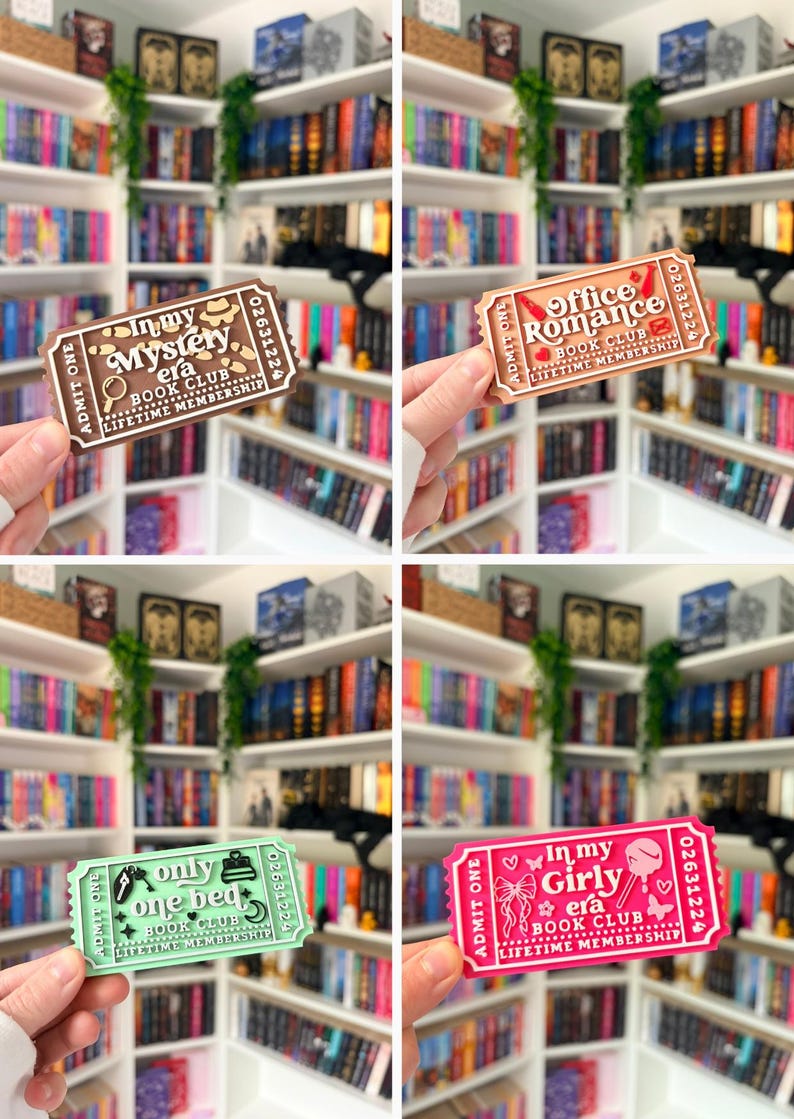 May include: A collection of four rectangular plastic ticket-shaped ornaments featuring book club themes. The brown ticket reads In my Mystery era, the peach ticket reads Office Romance, the mint ticket reads only one bed, and the pink ticket reads In my Girly era.