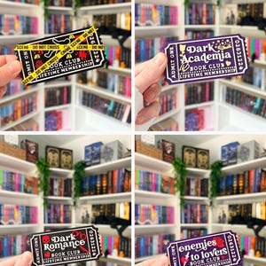 May include: Four rectangular paper tickets for a book club lifetime membership. One is black with yellow crime scene tape, one is purple with Dark Academia text, one is black with Dark Romance text, and one is purple with Enemies to Lovers text.