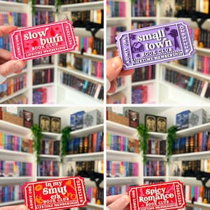 May include: A collection of four rectangular plastic tickets featuring book club themes. The pink ticket reads slow burn, the purple ticket reads small town, the red ticket reads In my smut era, and the other red ticket reads spicy romance.