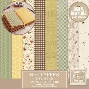 May include: A digital download of patterned papers with bee and floral designs. The papers include honeycomb, gingham, and daisy patterns, with the text "BEE PAPERS 8.5 x 11 inch PRINTABLE PAPERS". A small notebook and washi tape are in the upper left corner.