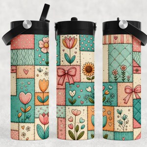 May include: Three cylindrical tumblers with black lids and handles, featuring a patchwork design of pastel pink, teal, and cream squares. The pattern includes illustrations of flowers, hearts, and bows with visible stitched outlines throughout.