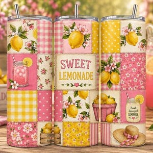 May include: Three cylindrical tumblers with straws featuring a patchwork design of pink and yellow gingham, polka dots, and floral patterns. The tumblers display illustrations of lemons, lemonade jars, a basket of lemons, and a straw hat with the text SWEET LEMONADE.