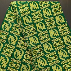 African print fabric, gold glitter Ankara fabric, green gold adinkra inspired print fabric, dressmaking home decor fabric by the yard