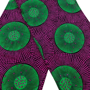 Afrikanskt Ankara vaxtryckt tyg på metervara, rosa och grönt cirkulärt Ankara, djärvt geometriskt prickmönster, iögonfallande tyg för klänningar, hantverk