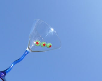 Blue Squiggle Stem Martini Glass with Olives