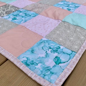 Baby girl quilt, pink and aqua crib sized patchwork blanket