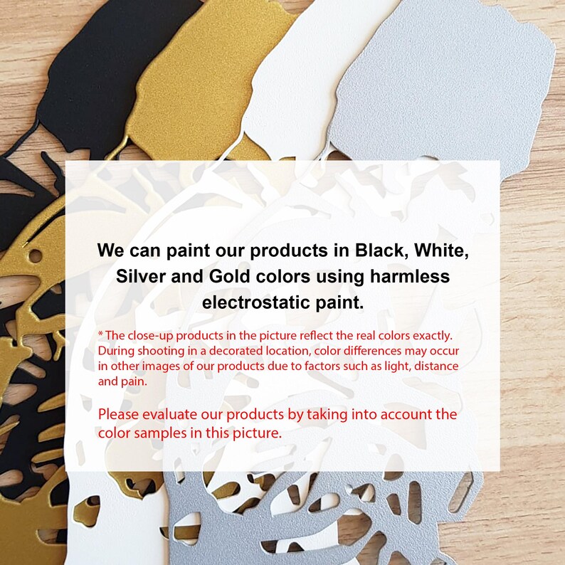 May include: Close-up of color samples for a product. The samples are in black, white, silver, and gold. The text reads: "We can paint our products in Black, White, Silver and Gold colors using harmless electrostatic paint."  The close-up products in the picture reflect the real colors exactly. During shooting in a decorated location, color differences may occur in other images of our products due to factors such as light, distance and pain. Please evaluate our products by taking into account the color samples in this picture.
