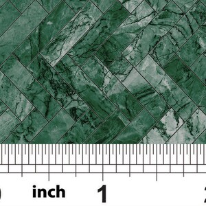 May include: Green marble tile pattern with a herringbone design. The tile is 1 inch wide.