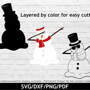 Puede incluir: Un dise&ntilde;o digital en capas de un mu&ntilde;eco de nieve haciendo el dab. El dise&ntilde;o est&aacute; en capas por color para facilitar el corte. El mu&ntilde;eco de nieve lleva un sombrero de copa negro, una bufanda roja y gafas de sol.