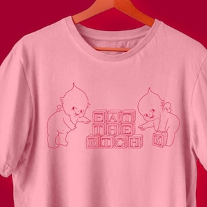 Kewpie Eat The Rich Unisex Pink T-Shirt Gildan 64000