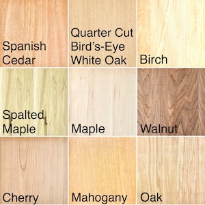 May include: A collage of nine wood samples, each labeled with its type: Spanish Cedar, Quarter Cut Bird's-Eye White Oak, Birch, Spalted Maple, Maple, Walnut, Cherry, Mahogany, and Oak.