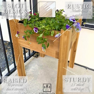 May include: A raised cedar wood planter with a rustic multi-tone finish. The planter has a slot design, making it easy to assemble. The planter is raised on sturdy 6.35 cm thick legs to prevent back strain.  "No tools needed" and "Custom Cedar Creations" are written on the planter.