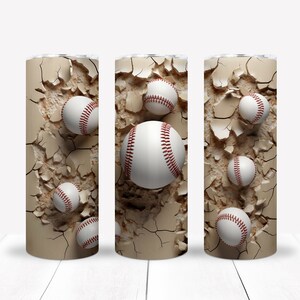 May include: A cylindrical tumbler featuring a graphic print of white baseballs with red stitching appearing to break through a beige, cracked wall surface. The design wraps around the entire exterior of the straight-sided beverage container.