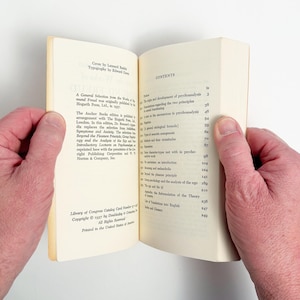 May include: A set of three ceramic mugs with a speckled, matte finish. The mugs are in shades of cream, light gray, and dark gray. Each mug has a simple, minimalist design, perfect for coffee or tea.