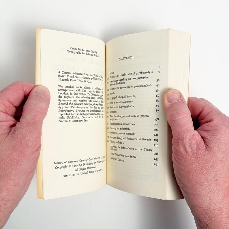 May include: A set of three ceramic mugs with a speckled, matte finish. The mugs are in shades of cream, light gray, and dark gray. Each mug has a simple, minimalist design, perfect for coffee or tea.