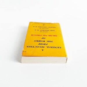 May include: A rustic wooden sign with the text "Welcome to our porch" in white lettering. The sign features a distressed finish and a simple, inviting design, perfect for outdoor decor.