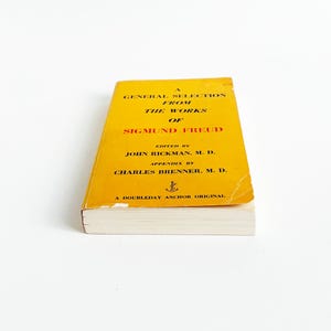 May include: A set of three ceramic mugs with a speckled, matte finish. The mugs are in shades of cream, light gray, and dark gray. Each mug has a simple, minimalist design and a rounded handle.