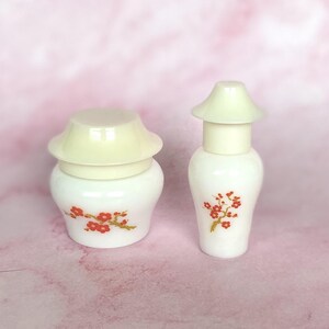 Tarro con bolsita de vidrio con leche coleccionable Imperial Garden de AVON vintage y mini perfume enrollable imagen 1
