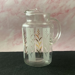 Vintage MCM Glass Pitcher: Retro Ice-Lip with Floral Design