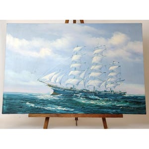 May include: A painting of a large sailing ship with white sails, set against a blue sky with white clouds. The ship is sailing on a blue ocean with whitecaps.