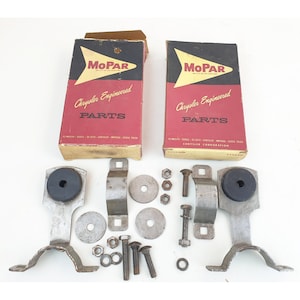 2 nowe stare zapasy Mopar, wspornik rury wydechowej i zespół zacisku część nr 2448308 NOS