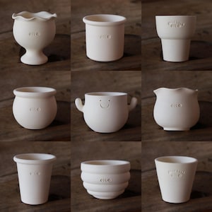 ハンドメイド Oli のテラコッタ プランター ポット