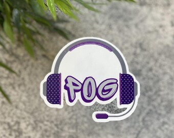 May include: Purple and gray sticker with a headset and the word "POG" in a stylized font.
