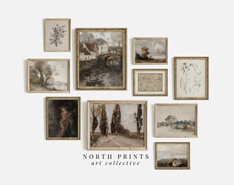 May include: A gallery wall featuring nine framed prints of landscapes and botanical illustrations. The prints are in various sizes and styles, with a mix of muted colours and textures. The wall is white and the frames are gold.