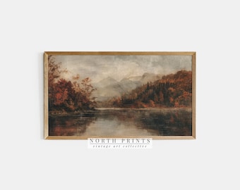 May include: A vintage landscape painting depicting a lake surrounded by trees and mountains. The painting is framed in a wooden frame and has a muted color palette of browns, greens, and blues.