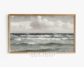May include: A vintage painting of a seascape with a light blue and white cloudy sky and a dark blue ocean with white waves. The painting is framed in a light brown wood frame.