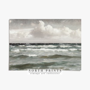 May include: A painting of a seascape with a cloudy sky and choppy waves. The water is a light blue-green color and the sky is a light gray. The painting is signed "NORTH PRINTS vintage art collective" in the bottom right corner.