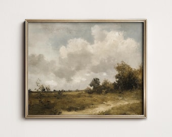May include: A framed landscape painting with a gold-colored frame. The artwork depicts a field with a dirt path, trees, and a cloudy sky. The color palette is dominated by muted greens, browns, and blues, creating a vintage aesthetic.
