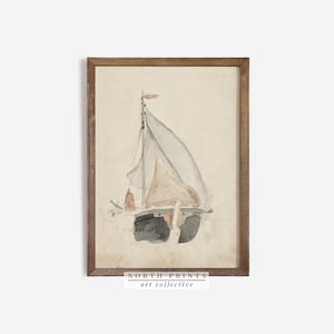 Puede incluir: Una pintura de acuarela de un velero con una vela blanca y un casco marr&oacute;n. La pintura est&aacute; enmarcada en un marco de madera marr&oacute;n claro. El texto "NORTH PRINTS art collective" est&aacute; impreso debajo de la imagen.