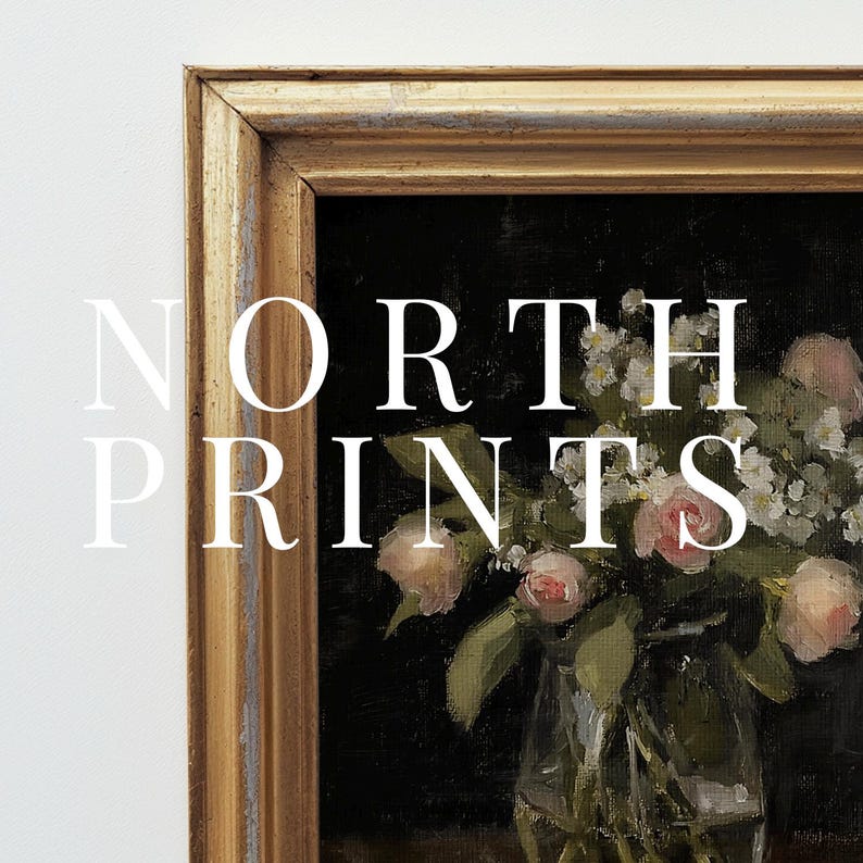 May include: A framed painting of a bouquet of white and pink flowers in a glass vase. The flowers are arranged in a loose, natural style. The painting is set against a dark background.